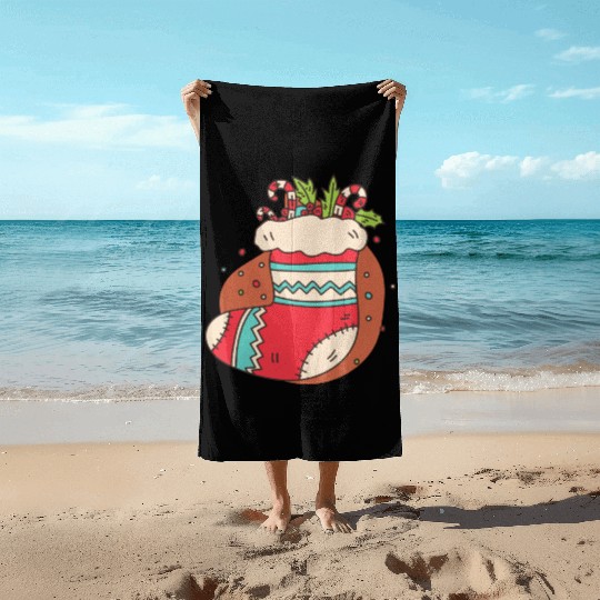 christmas sock with candy canes Beach Towels