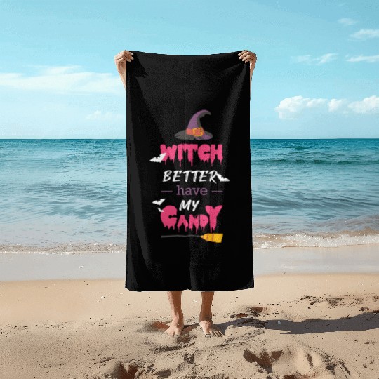 Halloween witch candy Beach Towels