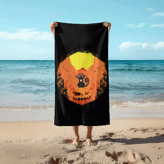 black Cat Sitting on Pumpkin Surrounded by Haunted Beach Towels