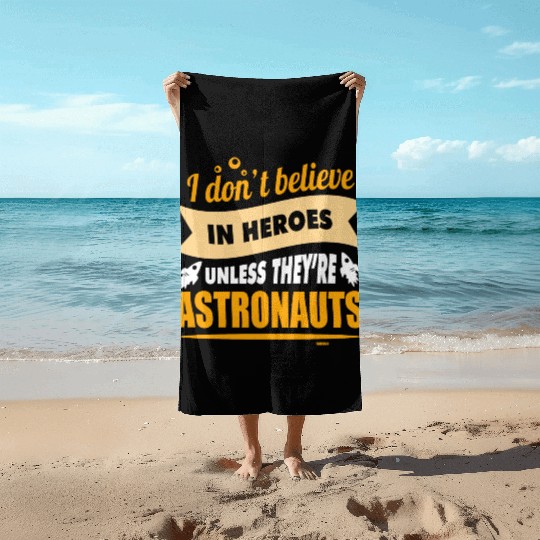 I believe in heroes when they are astronauts Beach Towels