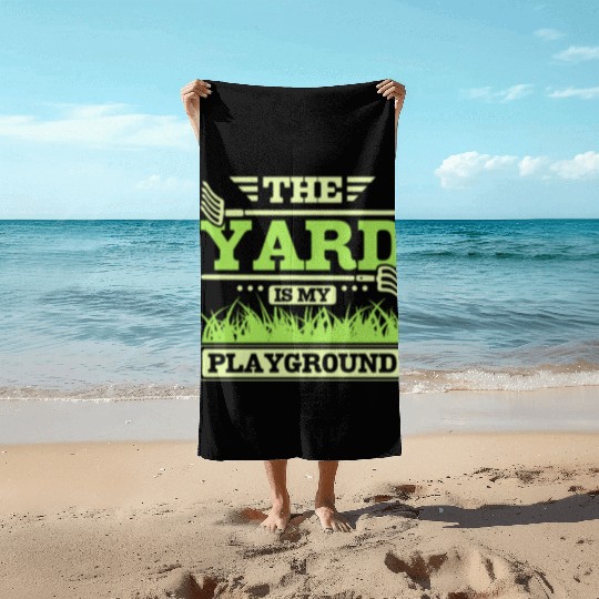 THe yard is my playground Beach Towels