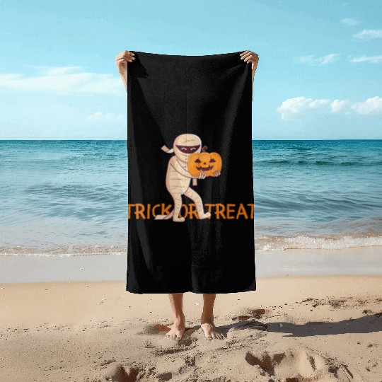 Trick or Treat mummy Beach Towels