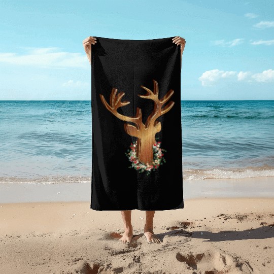 Deer head in wood look with Christmas wreath Beach Towels