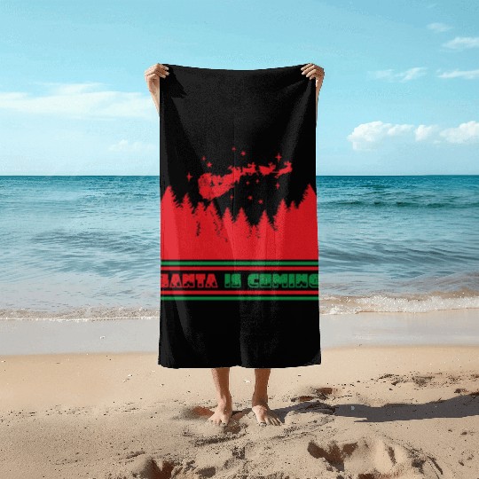 Santa is coming Beach Towels