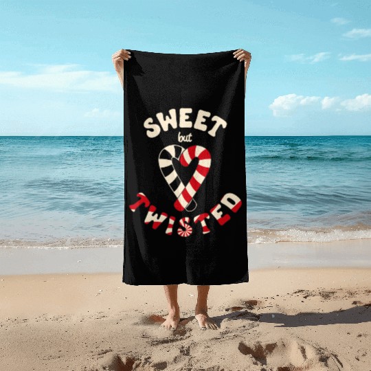 Sweet but twisted candy canes pun Beach Towels