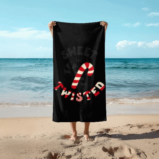Sweet but twisted candy canes pun Beach Towels