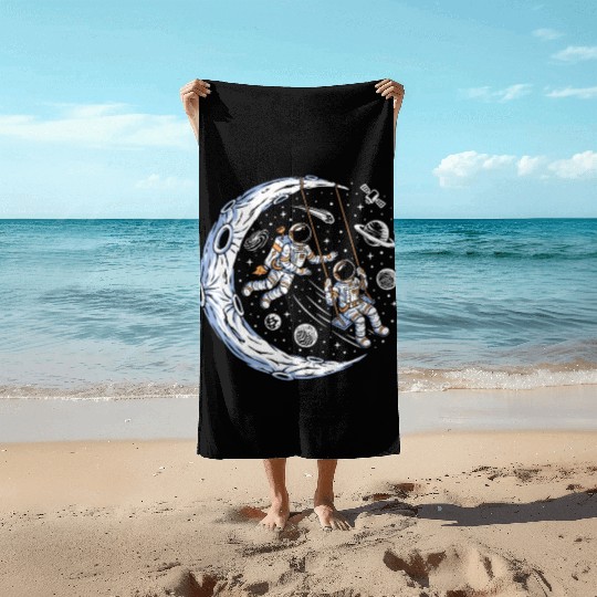 Astronauts on swing on moon Beach Towels