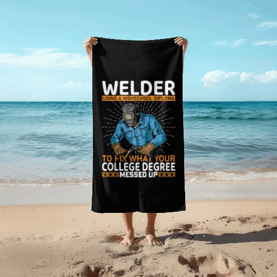 Welder using a high school Beach Towels