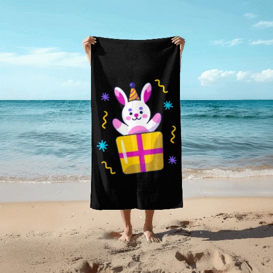 surprise box Beach Towels