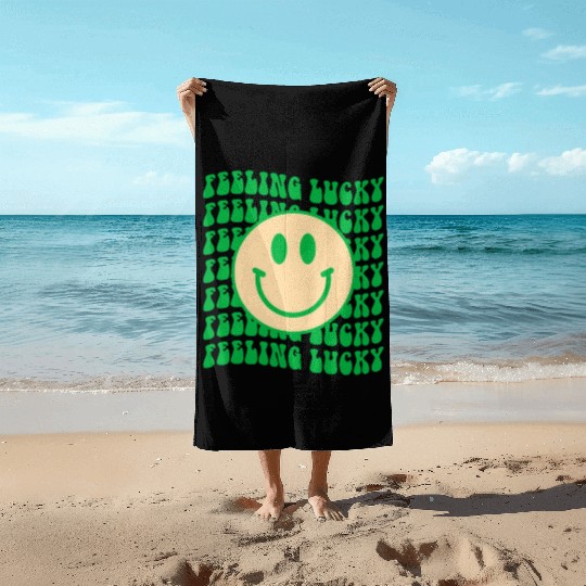 Feeling lucky Beach Towels