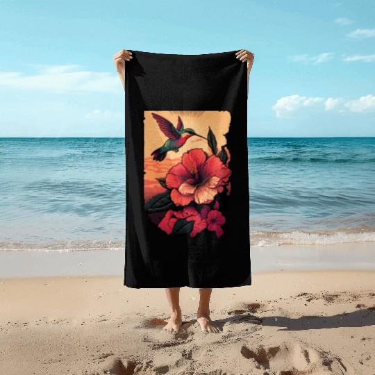 Hummingbird flies over hibiscus flower Tropical Beach Towels