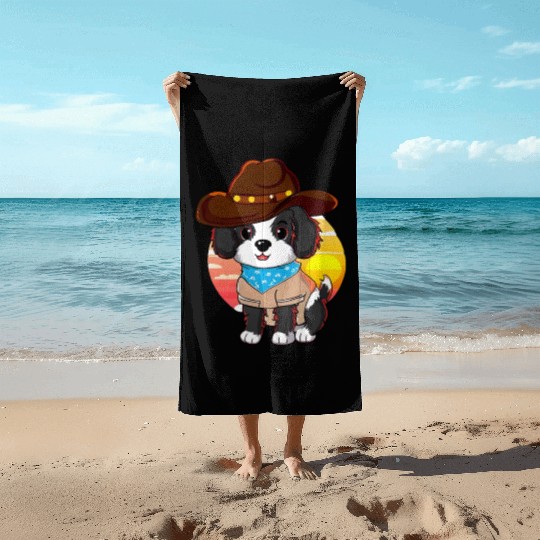 Cowboy dog at sunset Beach Towels