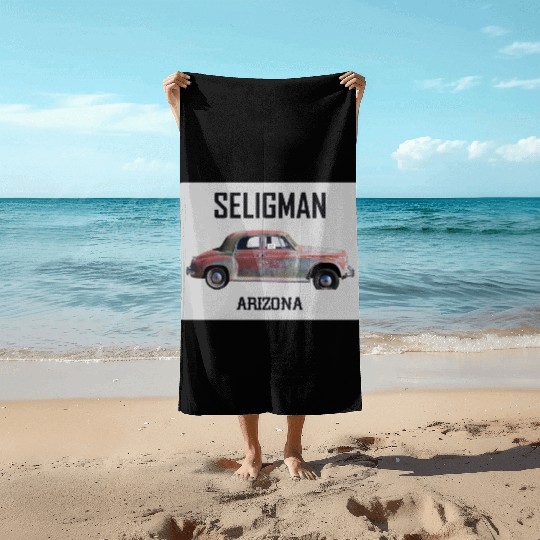 Old car city of Seligman in Arizonna, US Route 66 Beach Towels
