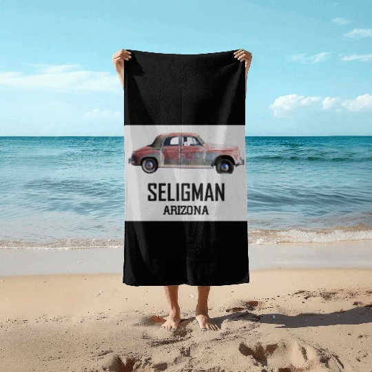 Old car city of Seligman in Arizonna, US Route 66 Beach Towels