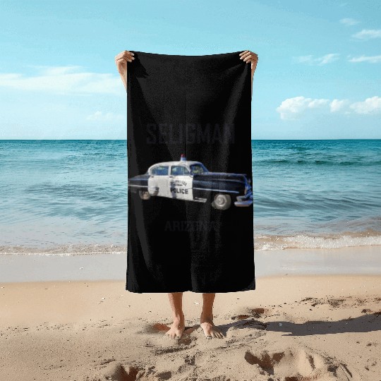 Old car city of Seligman in Arizonna, US Route 66 Beach Towels
