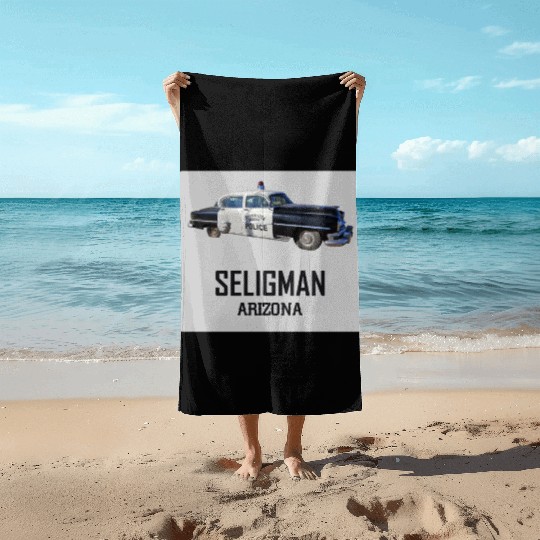 Old car city of Seligman in Arizonna, US Route 66 Beach Towels