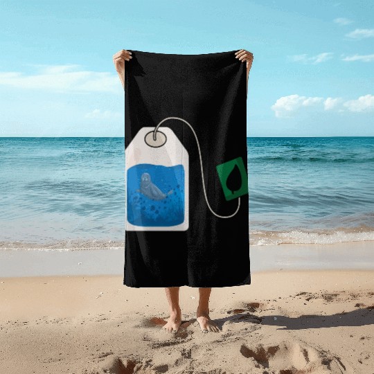 Funny seal swimming in a tea bag Beach Towels