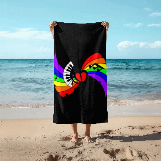Piano music key with rainbow Beach Towels
