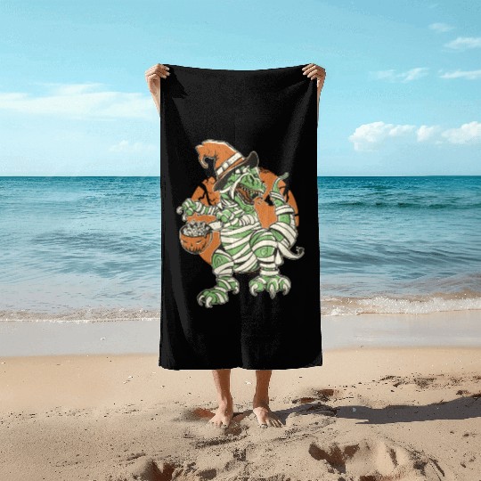 Halloween t-rex mummy Beach Towels