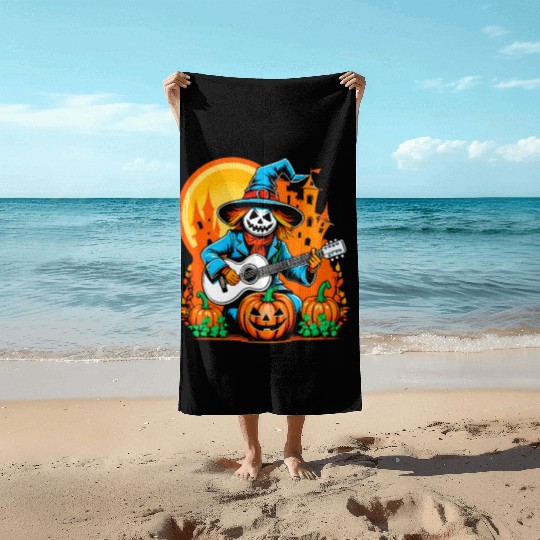Happy Halloween scarecrow plays guitar Beach Towels