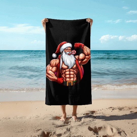 Muscular Santa Fit for the holidays Beach Towels