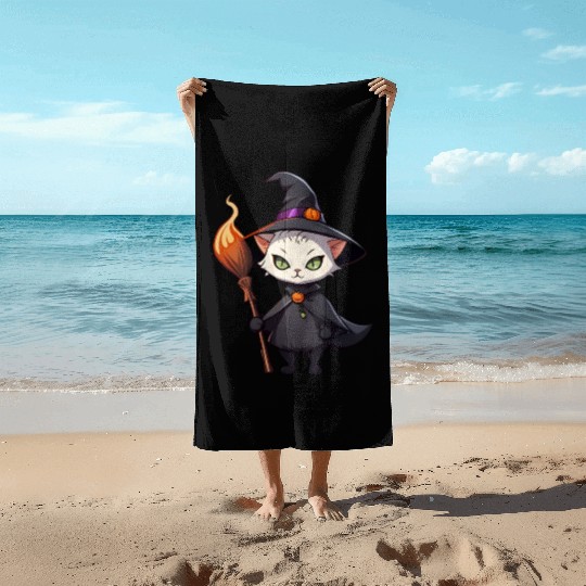 Cute Halloween cat with a witch hat. Beach Towels