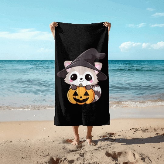 Cute Halloween raccoon Beach Towels