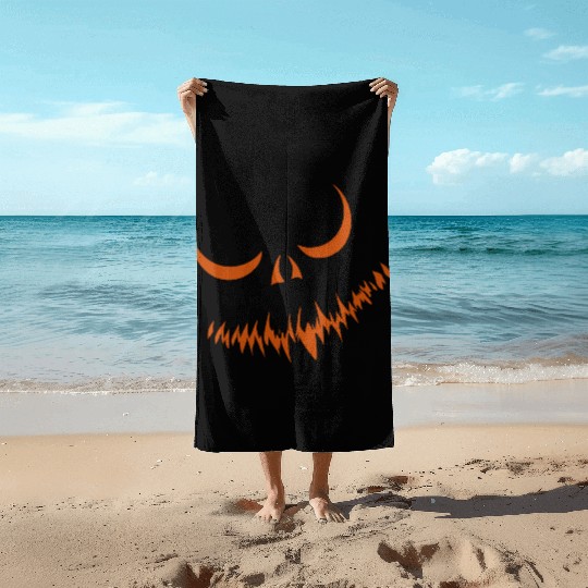 Creepy Jack o Lantern Carved Halloween Pumpkin Beach Towels