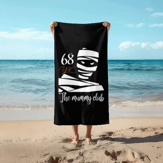 The mummy club Beach Towels