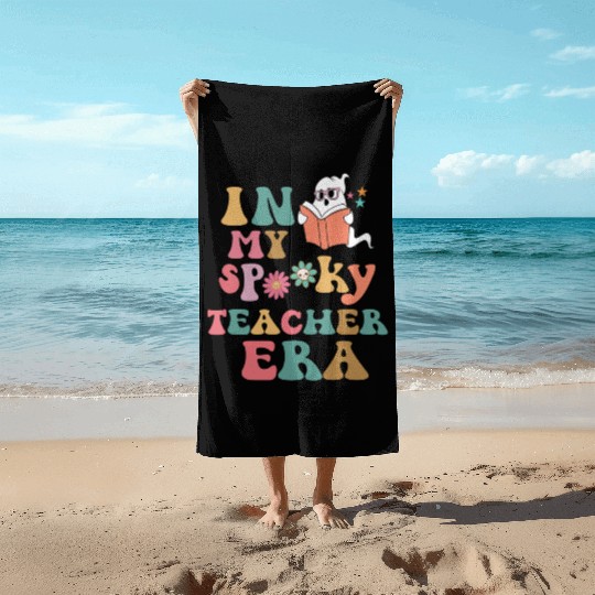 in my spooky teacher era Beach Towels