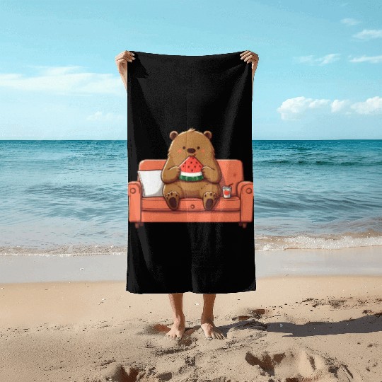 Cosy bear enjoying watermelon Beach Towels