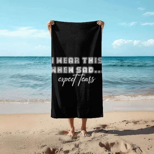 I wear this when sad expect tears Beach Towels