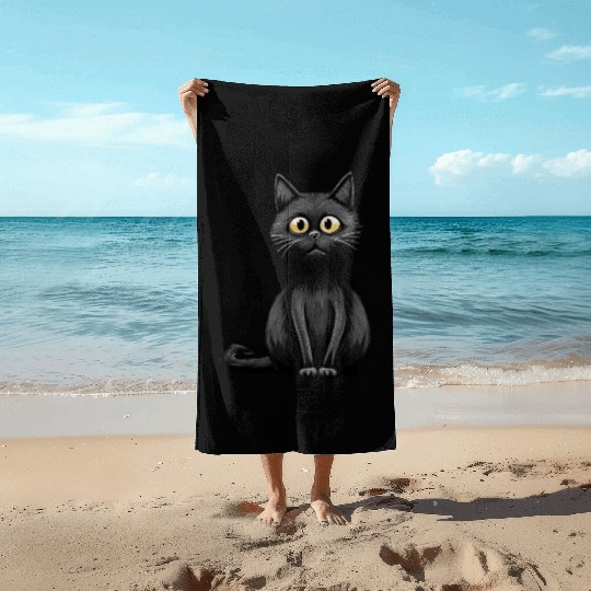 A midnight-colored cat with captivating amber eyes Beach Towels