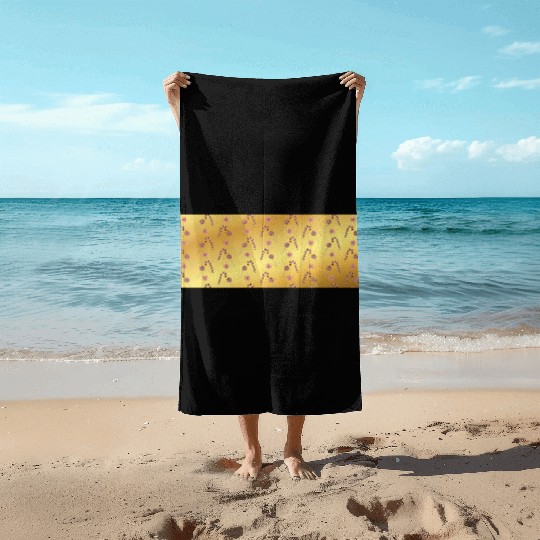 Christmas candy canes on a golden imitation backgr Beach Towels