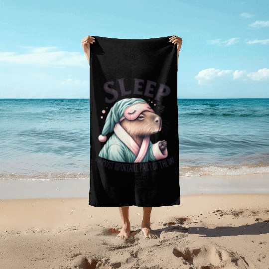 Sleepy Capybara in Comfy Pajamas Beach Towels