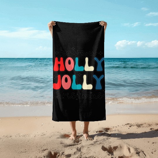Have a holly jolly Christmas Beach Towels