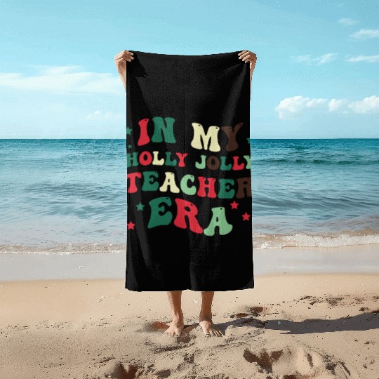 In my holly jolly teacher era Beach Towels