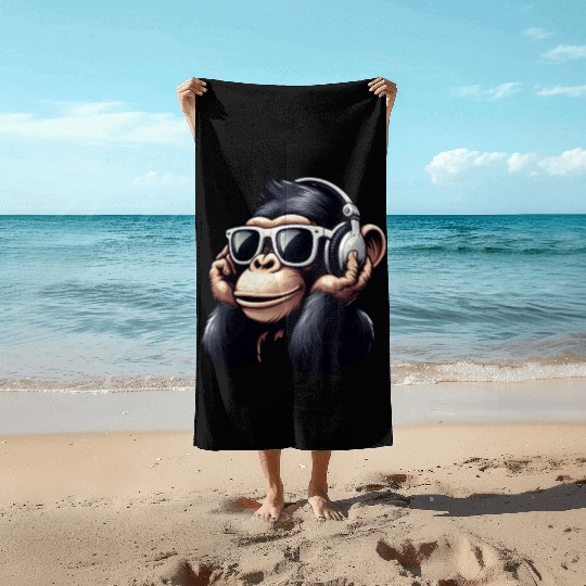 Chimpanzee with sunglasses and headphones Beach Towels