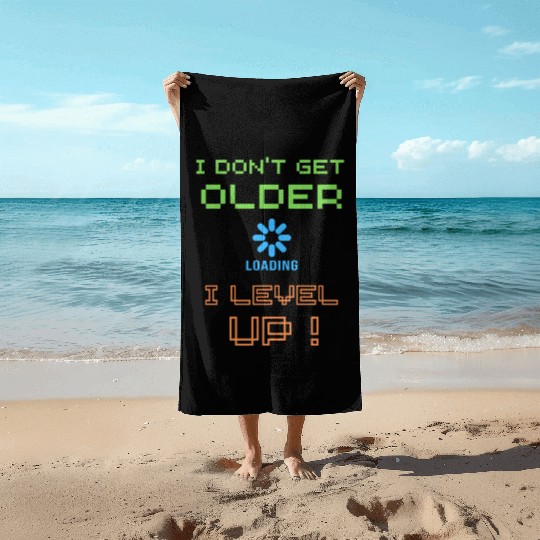I don't get older i level up Beach Towels