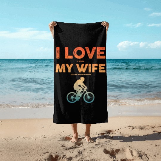 i love it when my wife lets me mountain bike Beach Towels