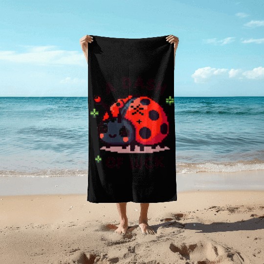 Ladybug: A dash of luck Beach Towels