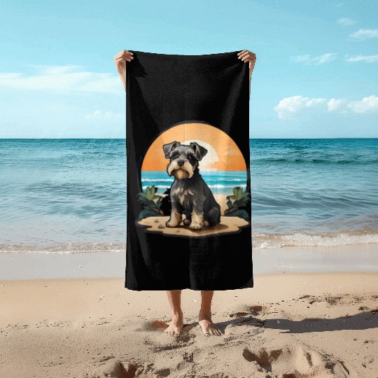 A miniature schnauzer dog in the beach Beach Towels