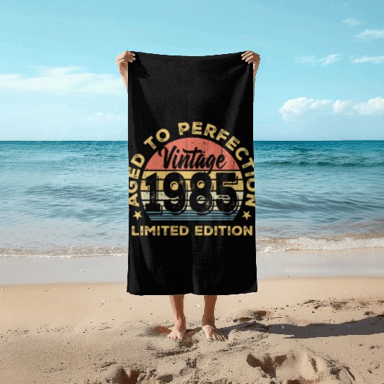 Aged to perfection 1985 Beach Towels