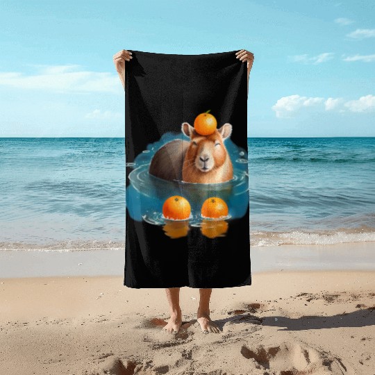 Blissful Capybara in the Water with Oranges Beach Towels