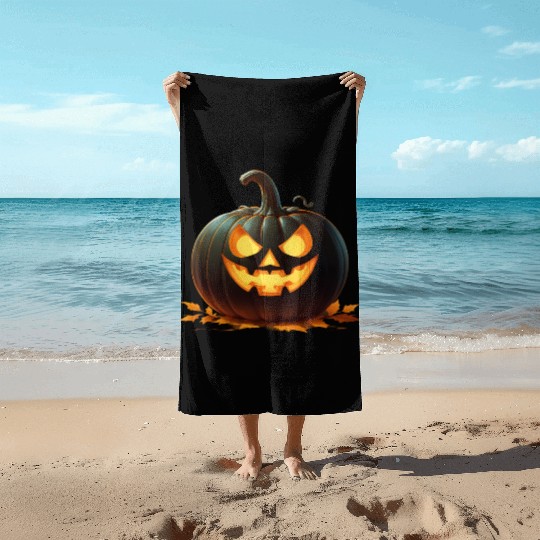 Midnight Glow: Enchanted Halloween Pumpkin Beach Towels