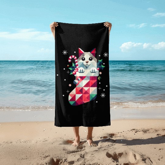 cute cat in a colorful Christmas stocking Beach Towels