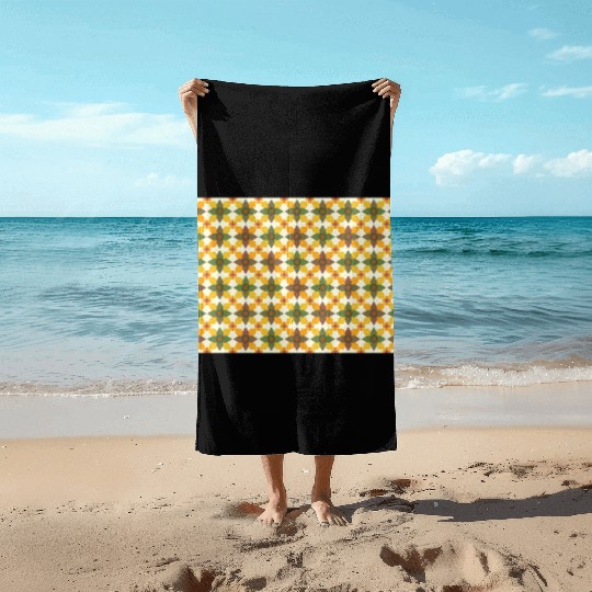 A colorful mixture of yellow green brown orange Beach Towels