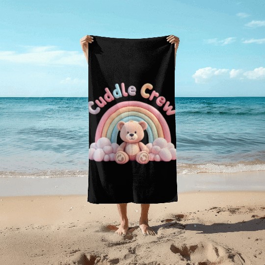 Soft teddy bear sitting under a rainbow Beach Towels