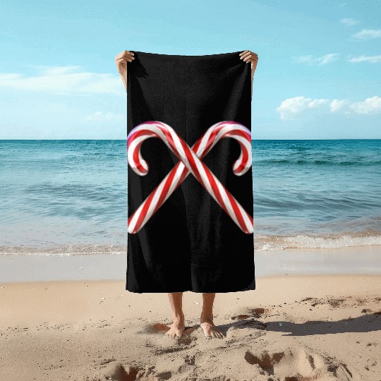 Crossed candy canes Beach Towels