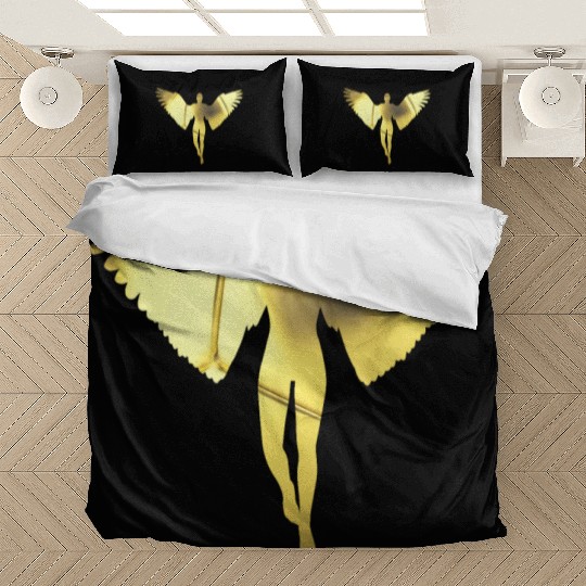 golden angel in a bright golden color Bedding Sets